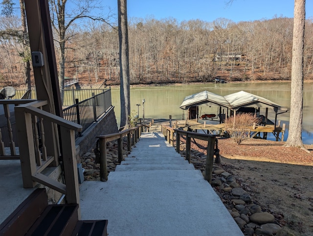 dock area with a water view