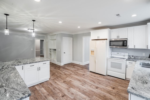 kitchen with light stone countertops, sink, hanging light fixtures, white appliances, and white cabinets