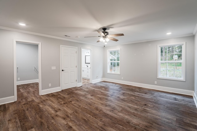 spare room featuring ceiling fan, a healthy amount of sunlight, and ornamental molding