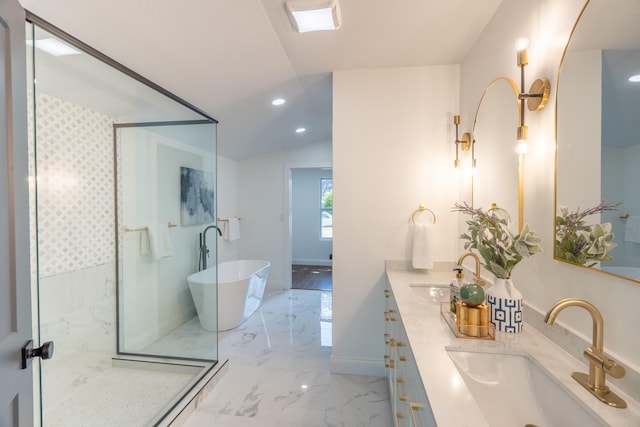 bathroom with vanity, separate shower and tub, and vaulted ceiling