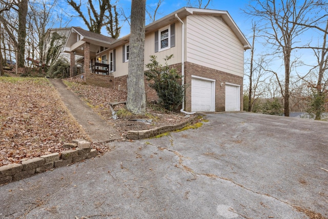 view of home's exterior with a garage