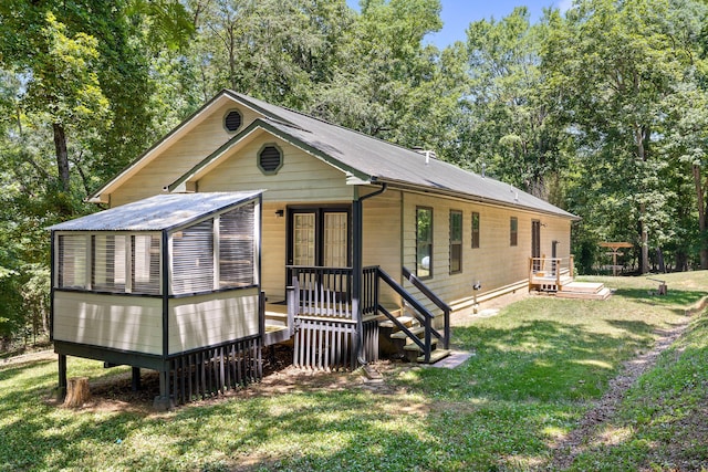 exterior space featuring a lawn