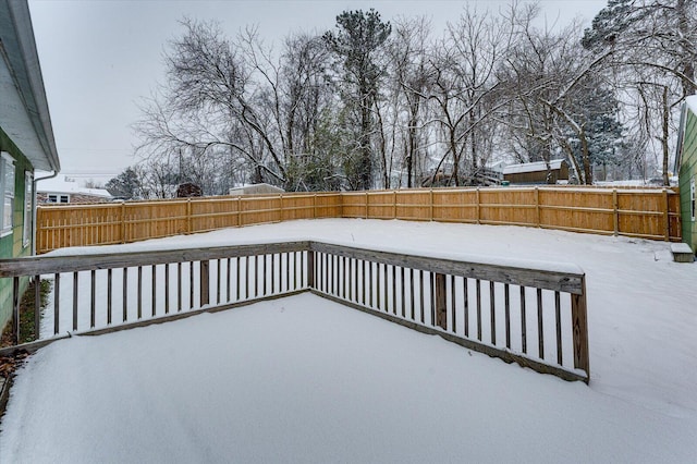 view of snow covered deck