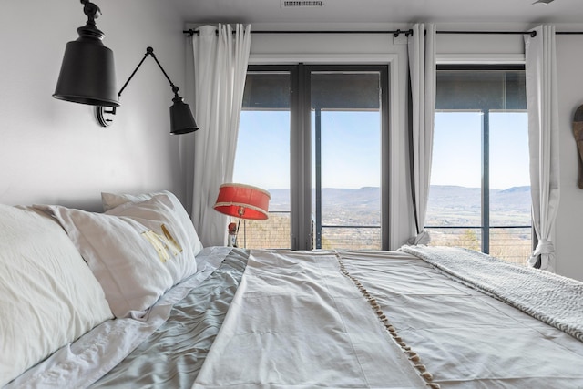 bedroom with a mountain view