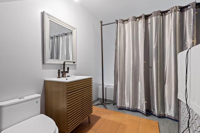 full bathroom featuring shower / tub combo, toilet, tile patterned flooring, and vanity