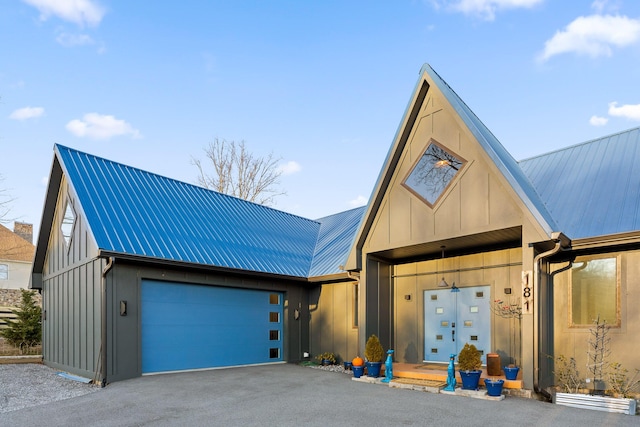 view of front of home with a garage