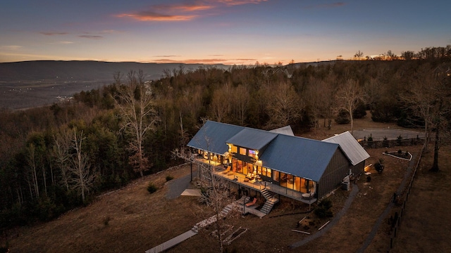 view of aerial view at dusk