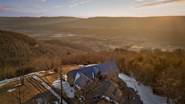 aerial view at dusk with a mountain view