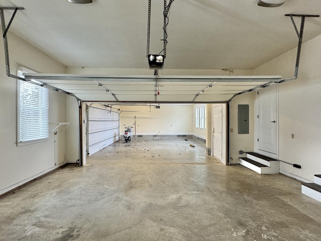 garage with electric panel and a garage door opener