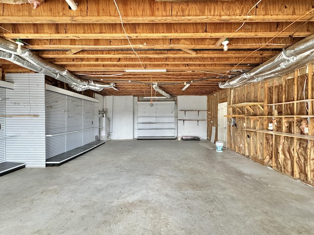 garage featuring water heater