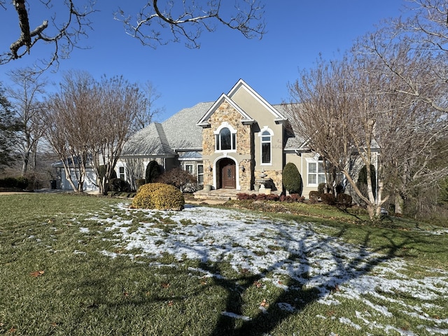 front of property with a lawn