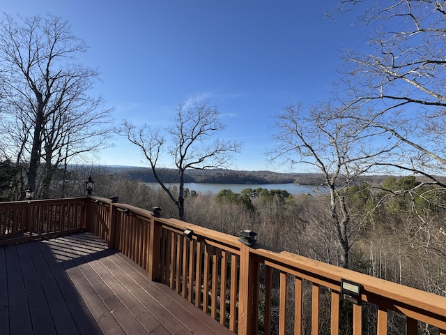 wooden deck with a water view