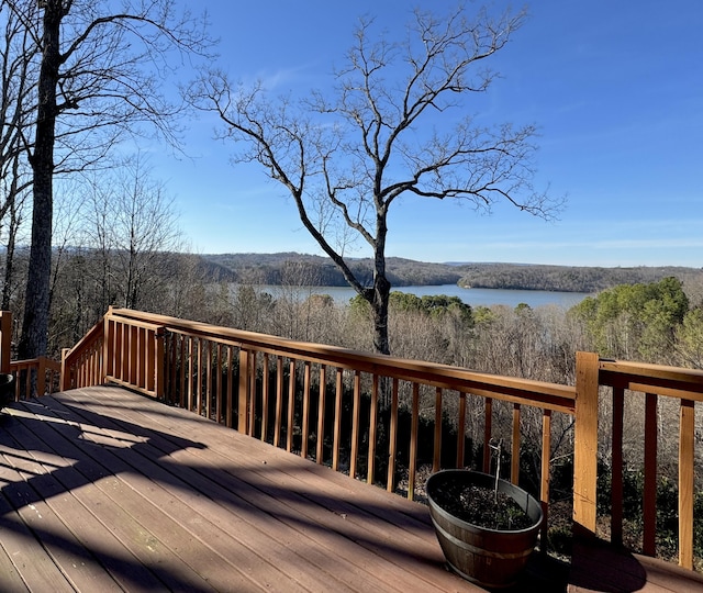 wooden deck with a water view