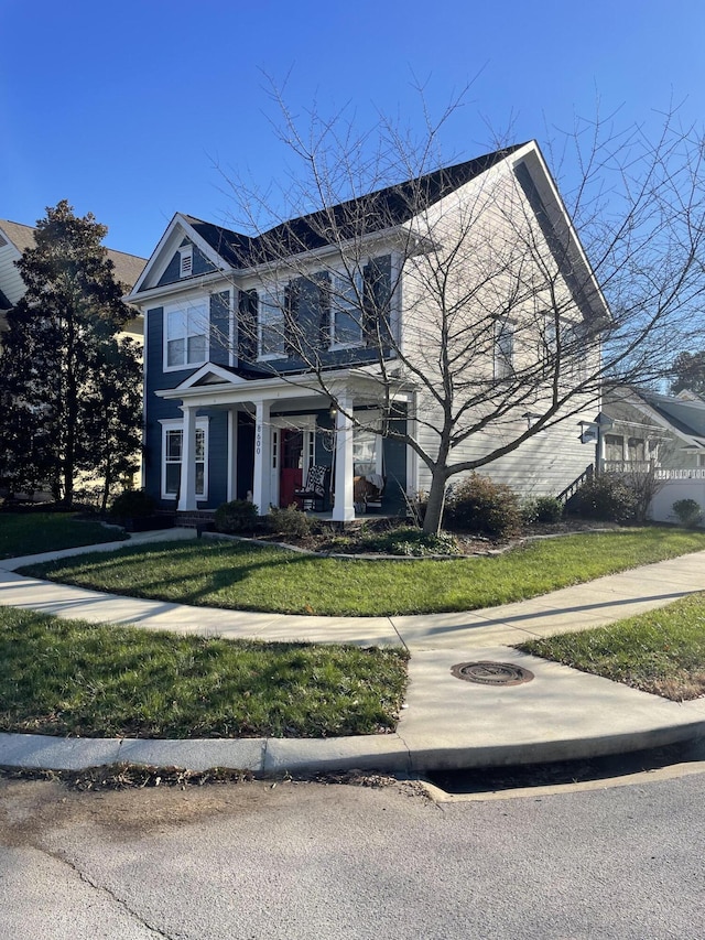 view of front of home featuring a front lawn