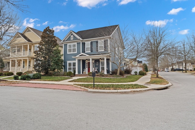 view of front of home with a balcony and a porch