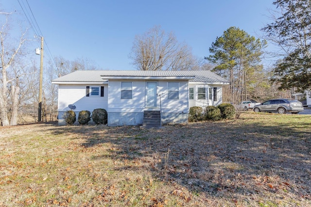 view of property exterior featuring a yard