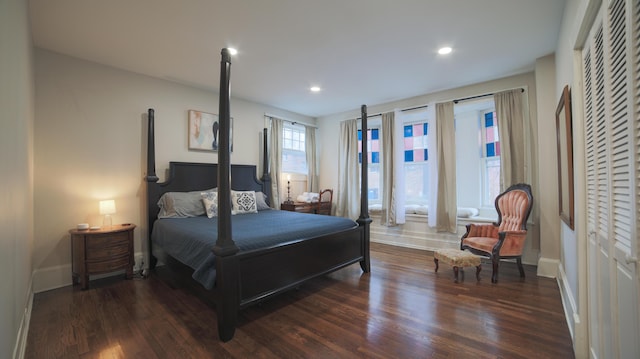 bedroom featuring dark wood-type flooring