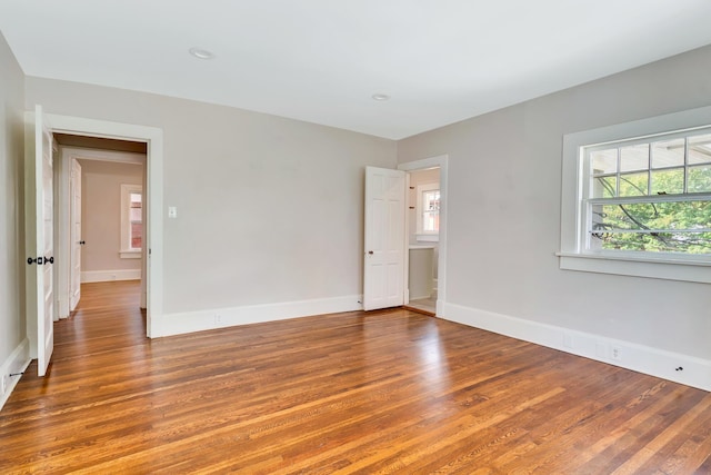 unfurnished bedroom featuring wood-type flooring