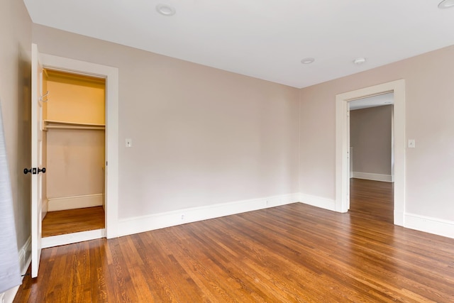 spare room featuring hardwood / wood-style floors