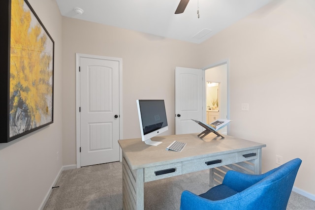 office featuring light carpet and ceiling fan