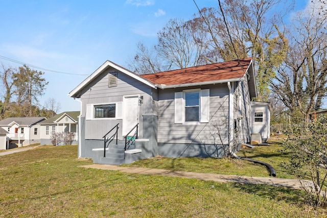 view of front of house with a front lawn