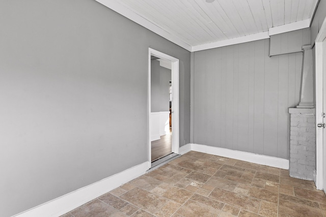 spare room with wooden ceiling