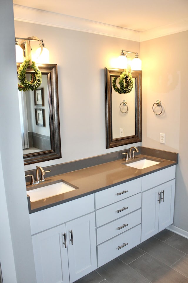 bathroom featuring crown molding, vanity, and tile patterned floors