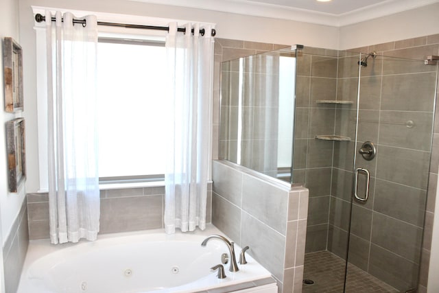 bathroom with ornamental molding and independent shower and bath