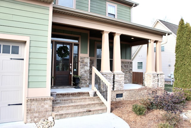 property entrance featuring covered porch