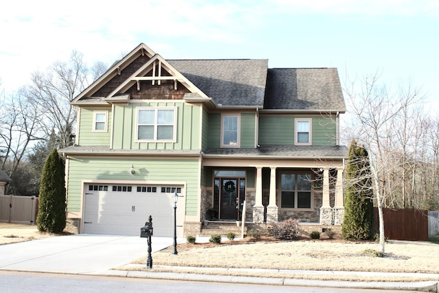 craftsman inspired home with a porch and a garage