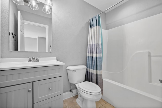 full bathroom featuring tile patterned floors, shower / bath combination with curtain, toilet, and vanity