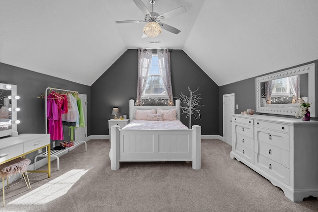 bedroom with light carpet, ceiling fan, and lofted ceiling