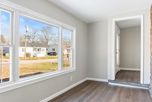 interior space with dark hardwood / wood-style floors