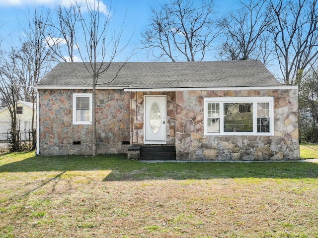 view of front of property with a front lawn