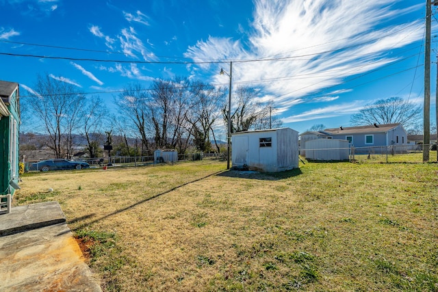 view of yard with a storage shed