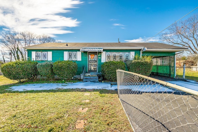 single story home with a front lawn