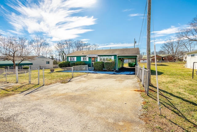 ranch-style home with a front lawn