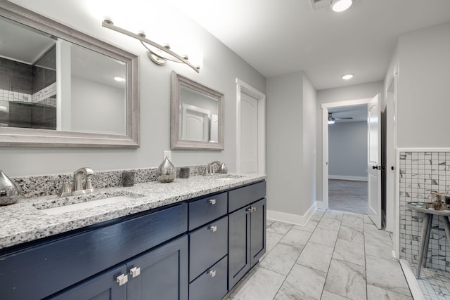 bathroom featuring vanity and ceiling fan