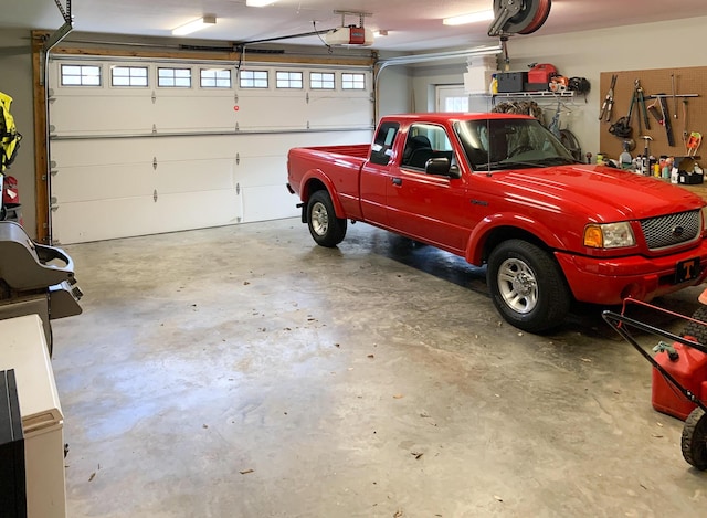 garage featuring a garage door opener