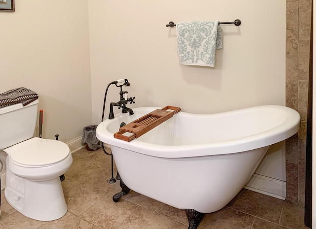 bathroom with a bathing tub and toilet