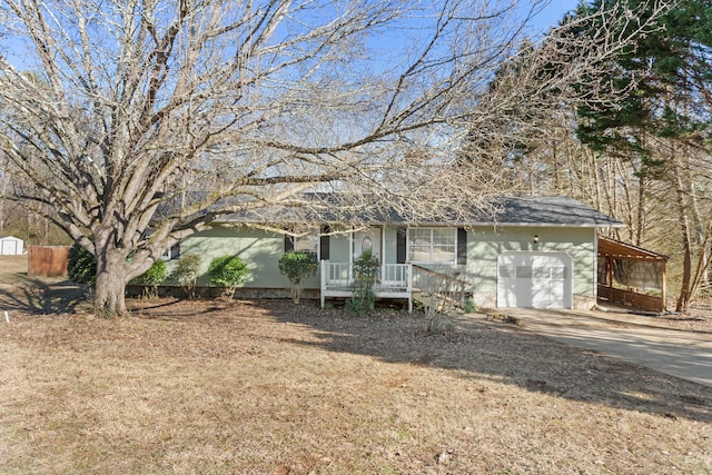 view of front of house with a garage and a carport