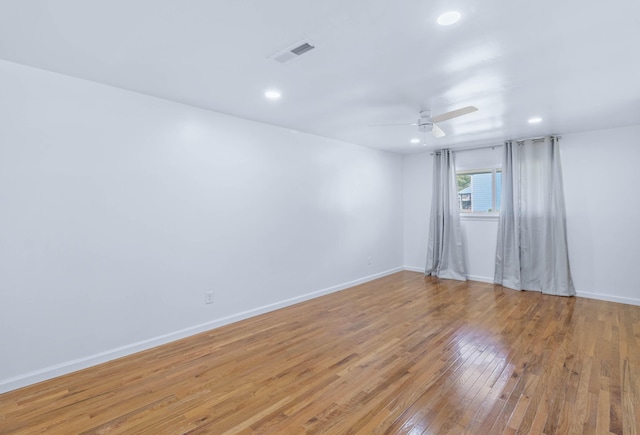 unfurnished room with light hardwood / wood-style floors and ceiling fan