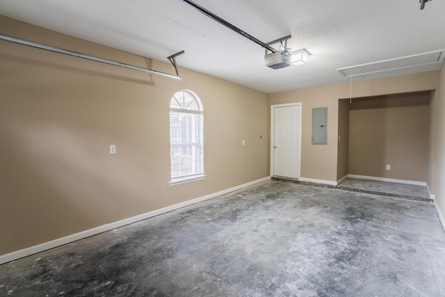 garage featuring electric panel and a garage door opener