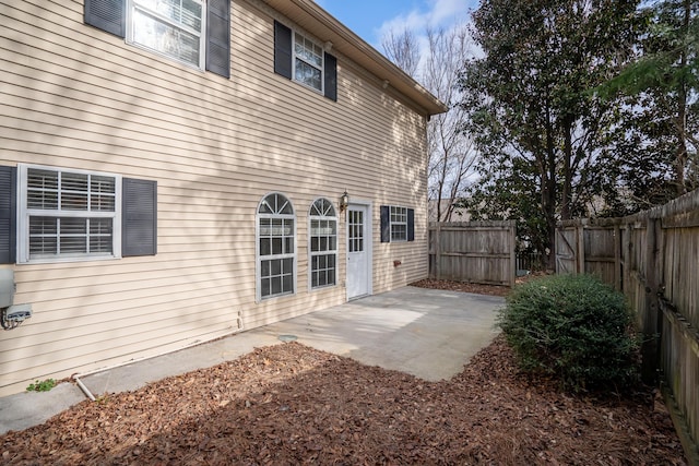 back of house with a patio area