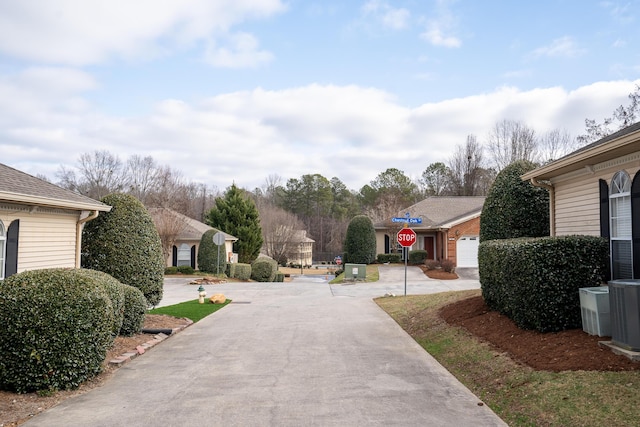 view of yard featuring central AC