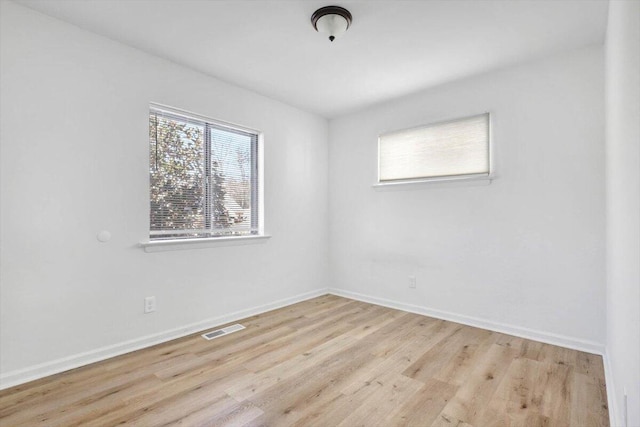 empty room featuring light hardwood / wood-style floors