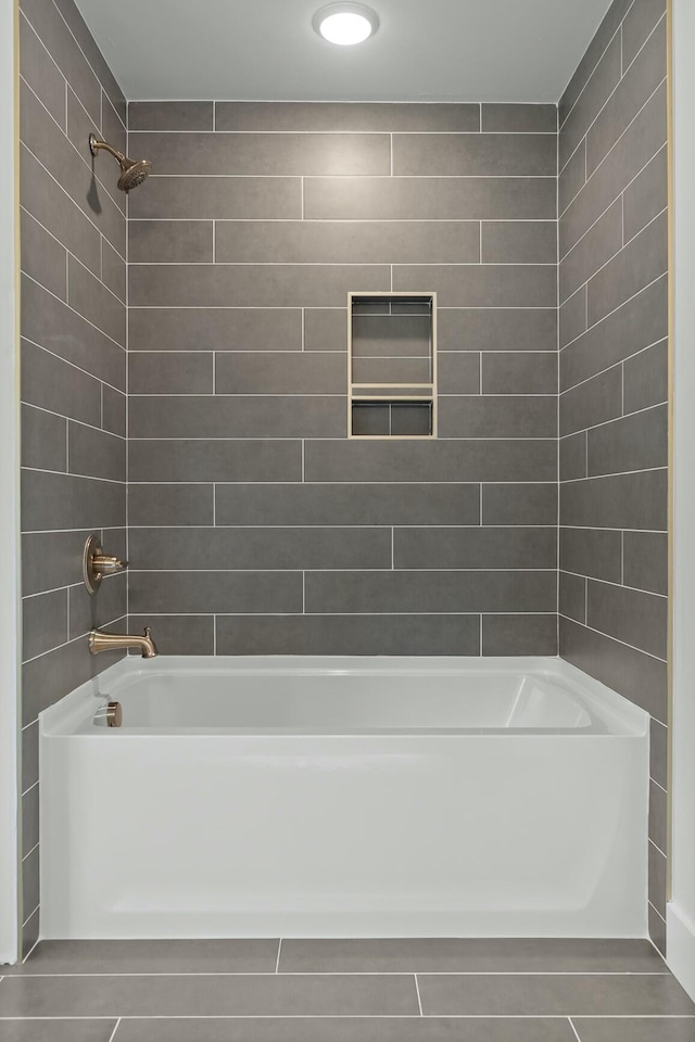 bathroom featuring shower / washtub combination