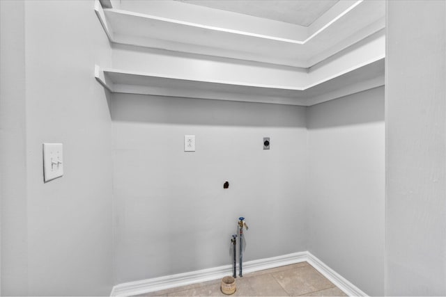 laundry room featuring washer hookup, tile patterned flooring, and electric dryer hookup