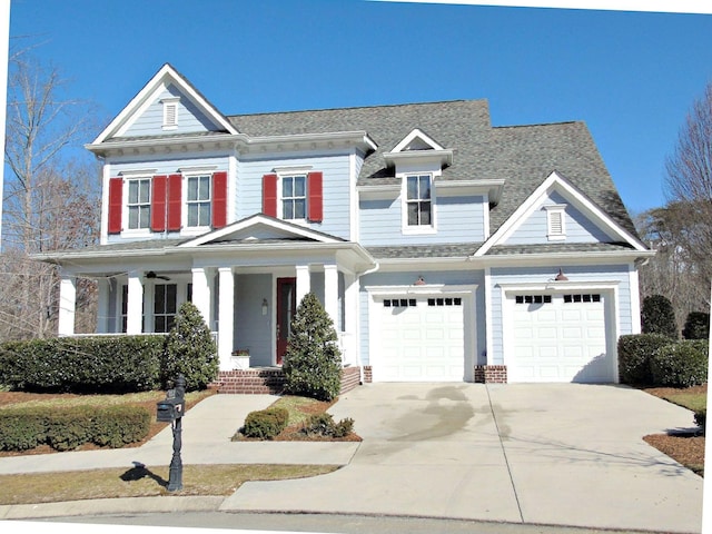 view of front of home featuring a garage and a porch