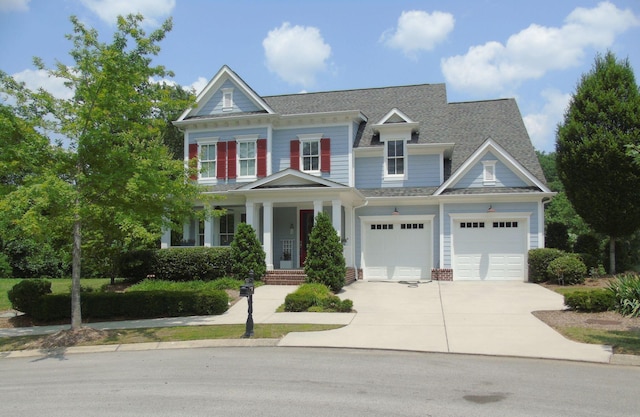 807 Blissfield Ct, Chattanooga, TN 37419 - view of front of property featuring concrete driveway, a porch, and roof with shingles